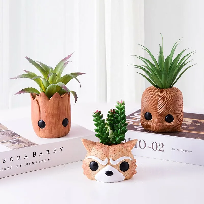 Artificial plants in cute ceramic planters