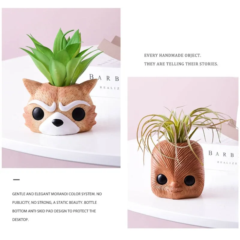 Artificial plants in cute ceramic planters