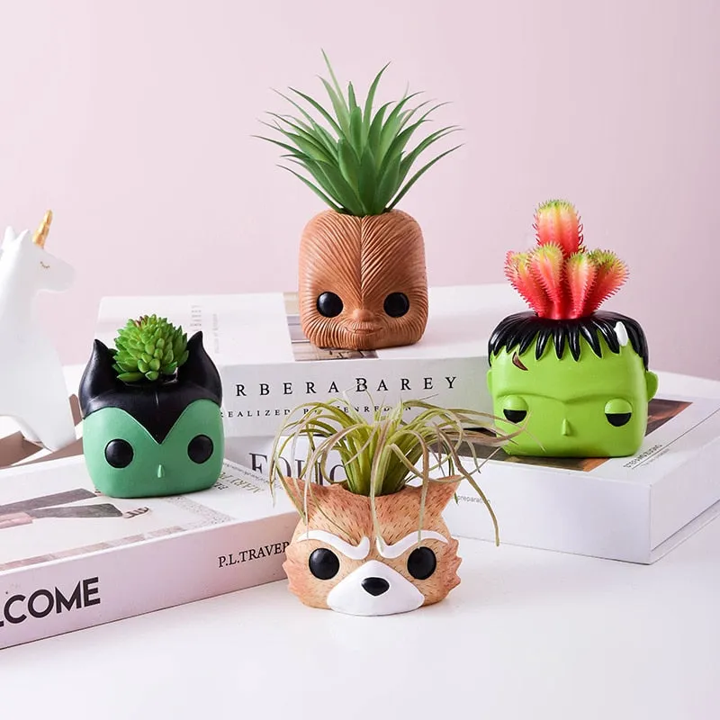 Artificial plants in cute ceramic planters